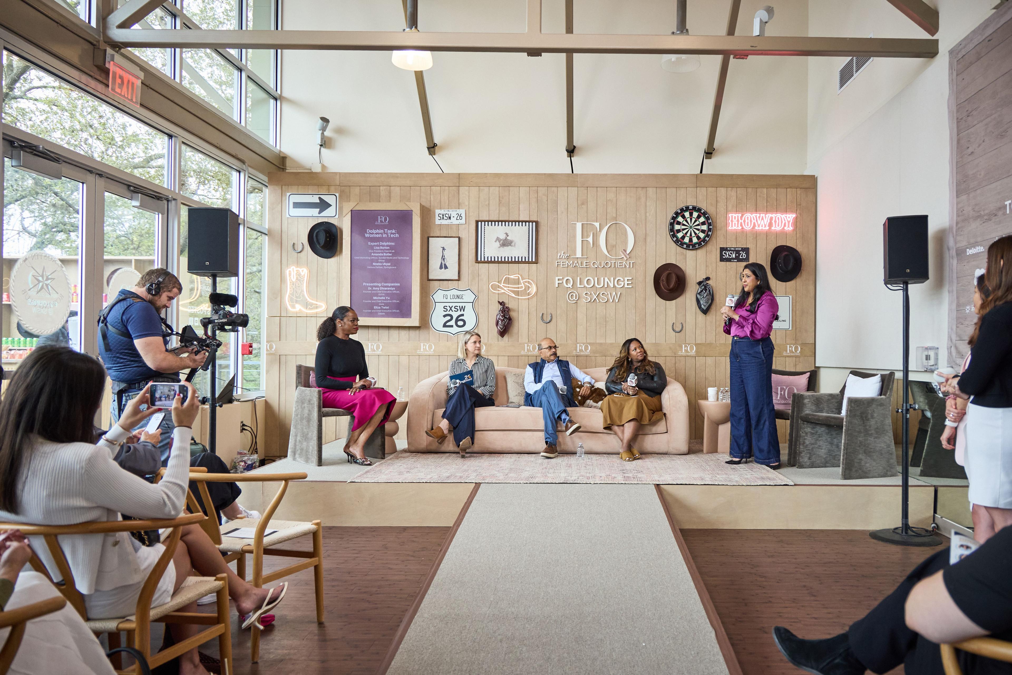 FQ Lounge set at SXSW — sofas, rug and a panel seated under a wood-panelled wall — Conventions & Tradeshows photography, Austin The FQ Lounge set at SXSW — sofas, rug and a panel seated under a wood-panelled wall.