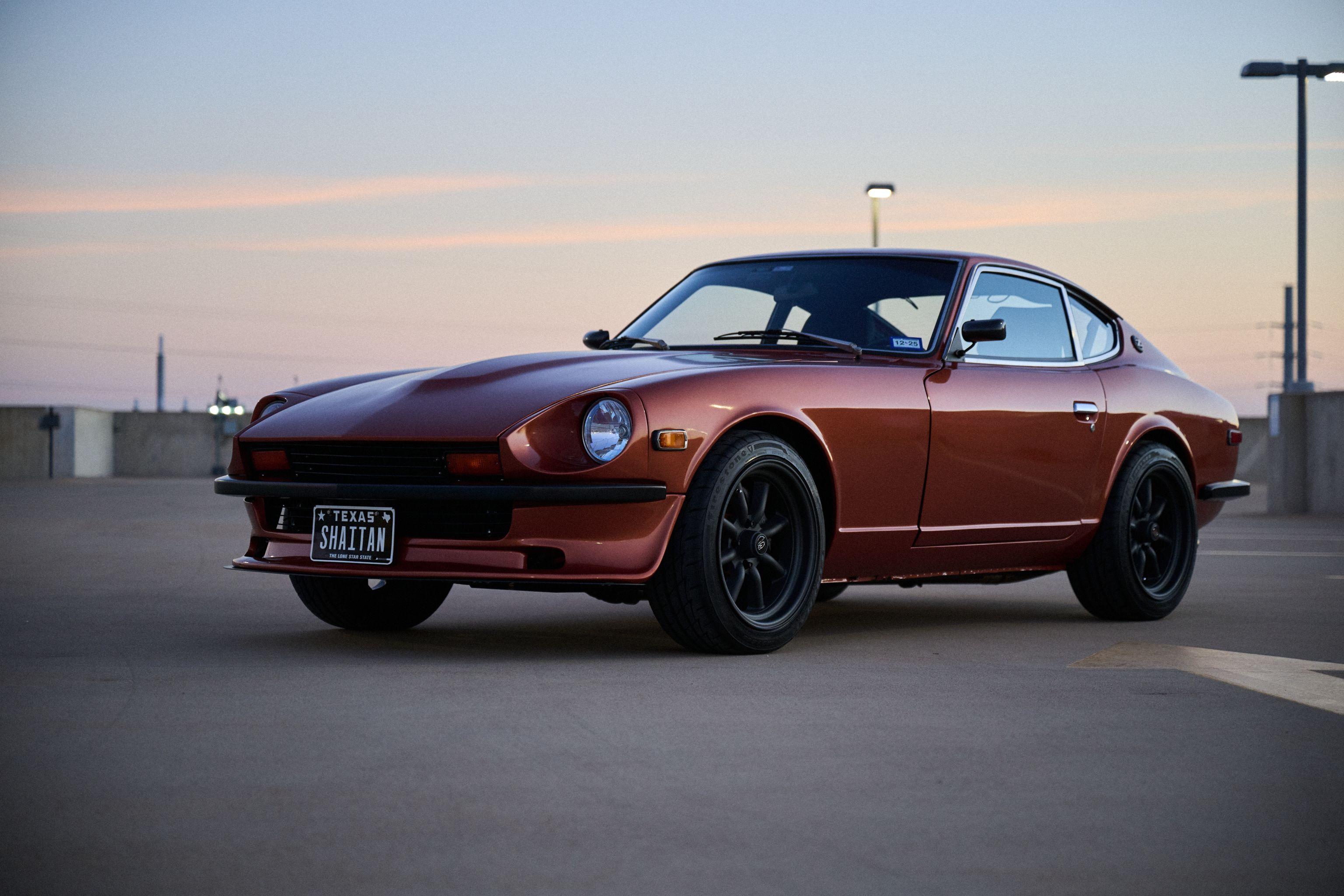 Maroon Datsun 240Z parked at dusk — Automotive photography, Austin A maroon Datsun 240Z parked at dusk.