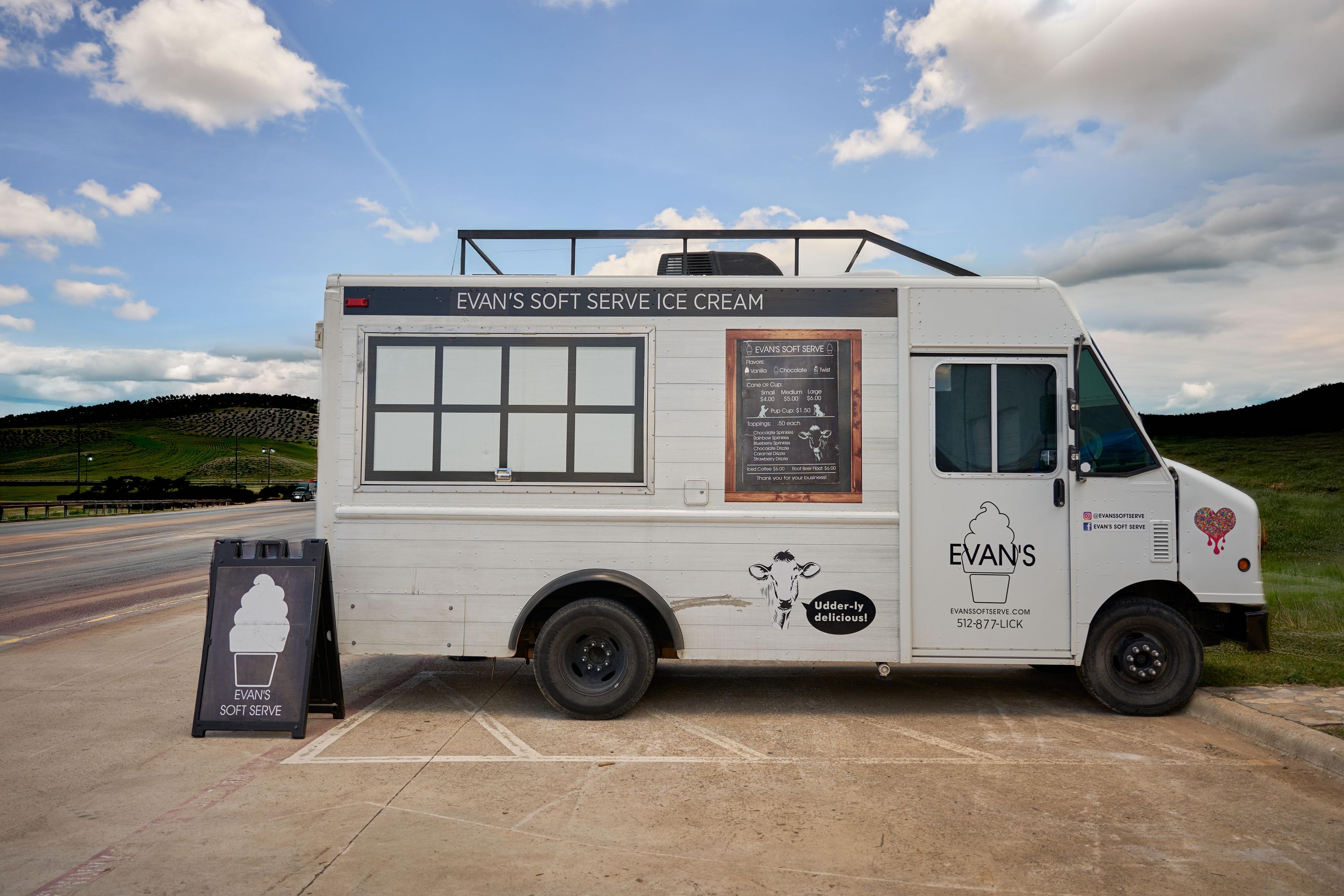 Evan's soft serve ice cream trailer parked on a patio — Hospitality & leisure photography, Austin An Evan's soft serve ice cream trailer parked on a patio.
