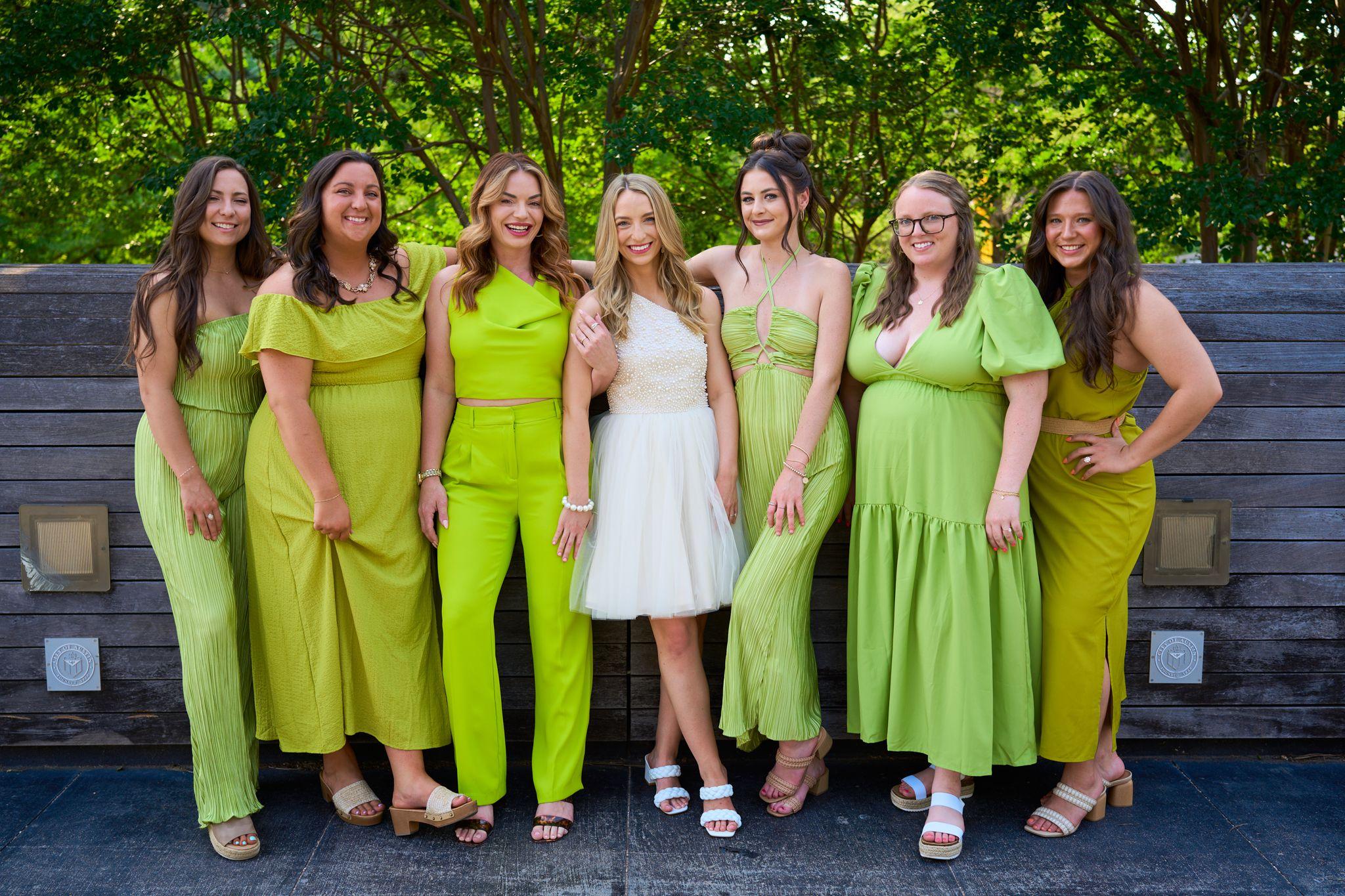 Group in matching lime green outfits standing with the bride-to-be in white — Bachelor & Bachelorette photography, Austin A group in matching lime green outfits standing with the bride-to-be in white.
