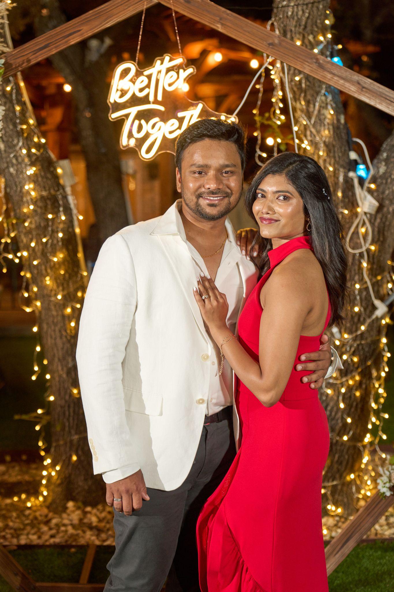 Couple in white and red under a 'Better Together' neon sign and warm string lights — Elopements photography, Austin A couple in white and red under a 'Better Together' neon sign and warm string lights.