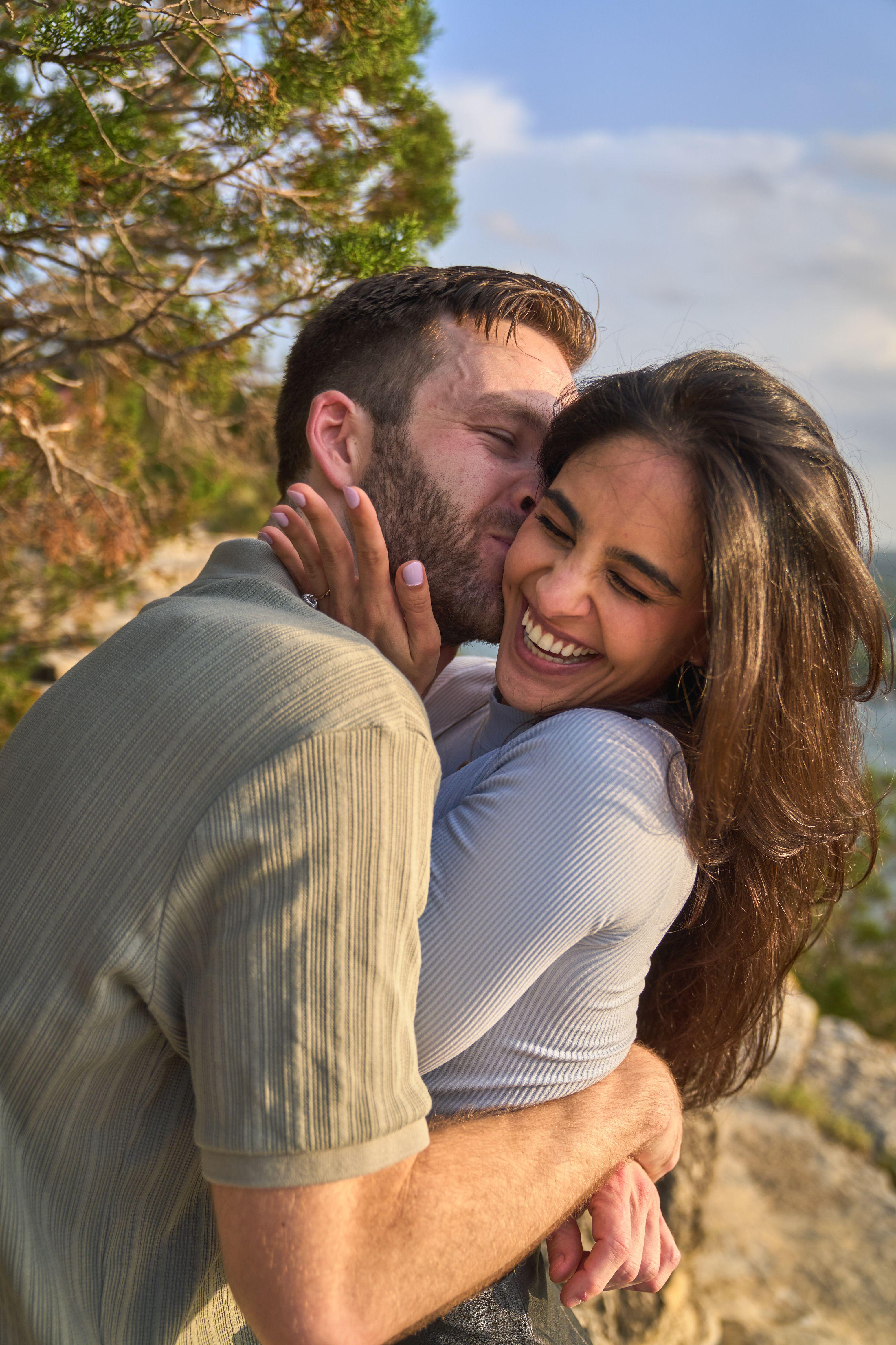 Couple embracing at the Mount Bonnell overlook — Mount Bonnell portraits, Austin Couple embracing at the Mount Bonnell overlook