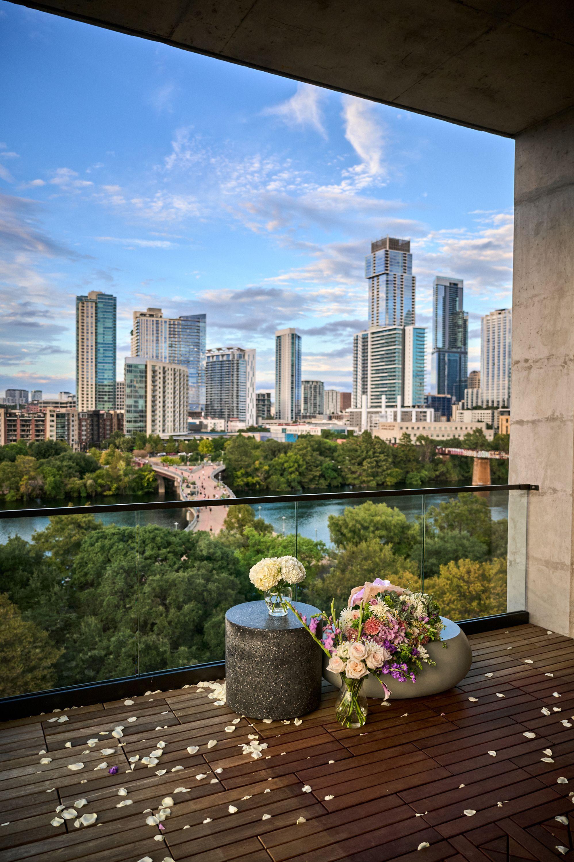 A rooftop terrace overlooking the Austin skyline and Lady Bird Lake.