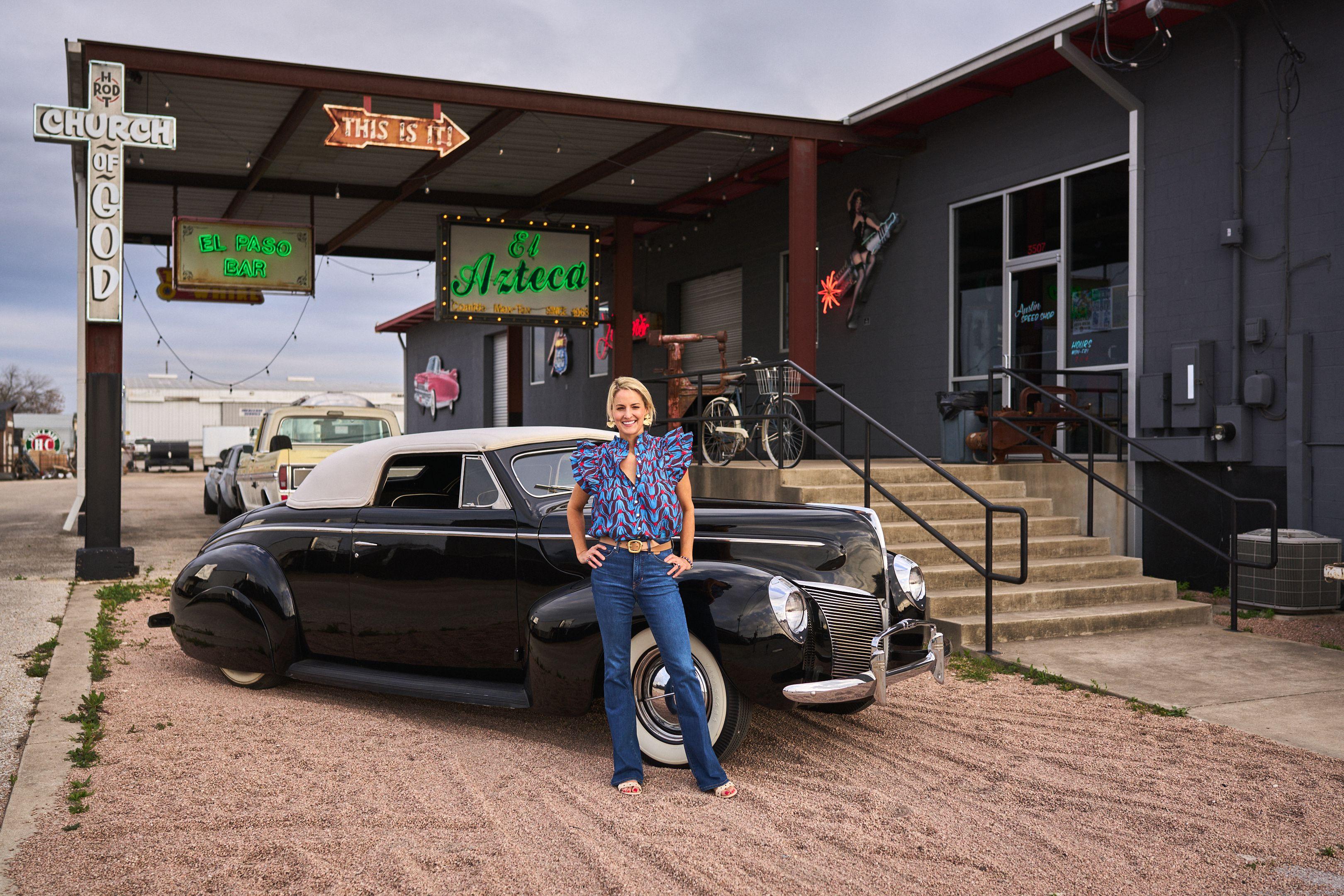 Woman leaning against a vintage black car outside a neon-lit cantina — Portrait photography, Austin A woman leaning against a vintage black car outside a neon-lit cantina.