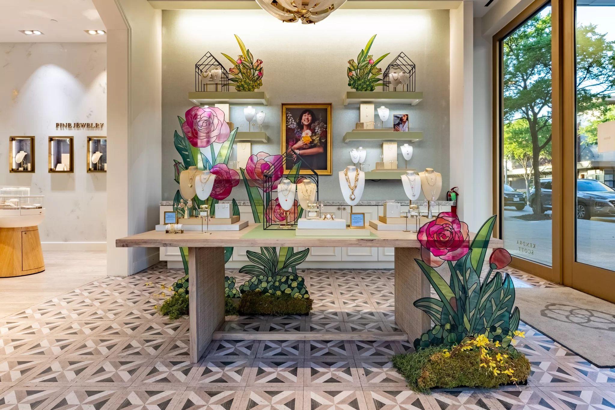 Retail display table with jewelry, plants and a framed portrait — Architectural photography, Austin A retail display table with jewelry, plants and a framed portrait.