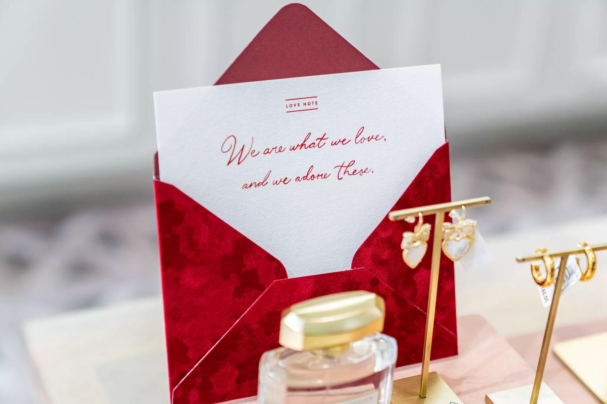 Letterpress card and red envelope styled with a perfume bottle — Product photography, Austin A letterpress card and red envelope styled with a perfume bottle.