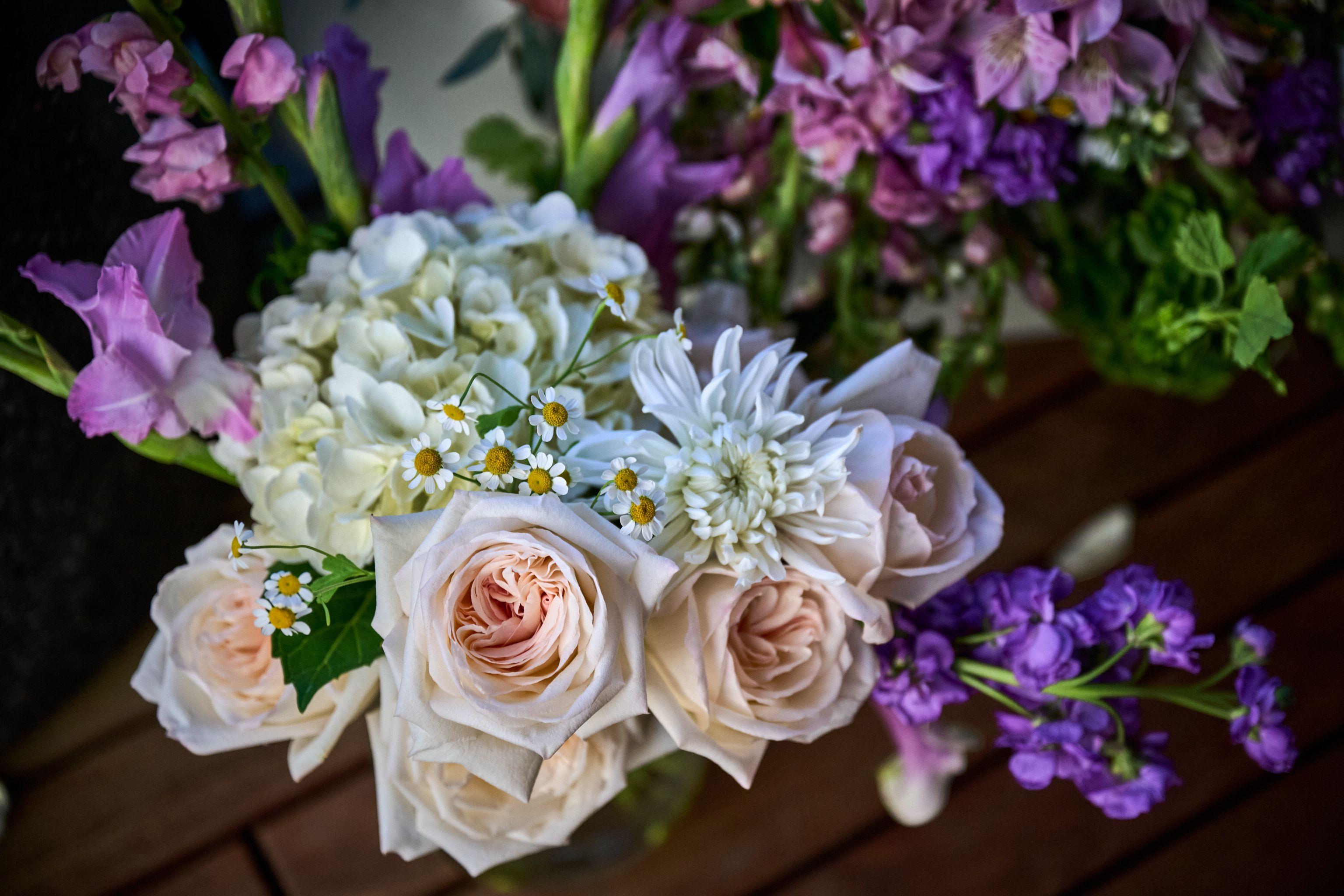 Macro detail of blush roses and white blooms in an arrangement — Product photography, Austin A macro detail of blush roses and white blooms in an arrangement.