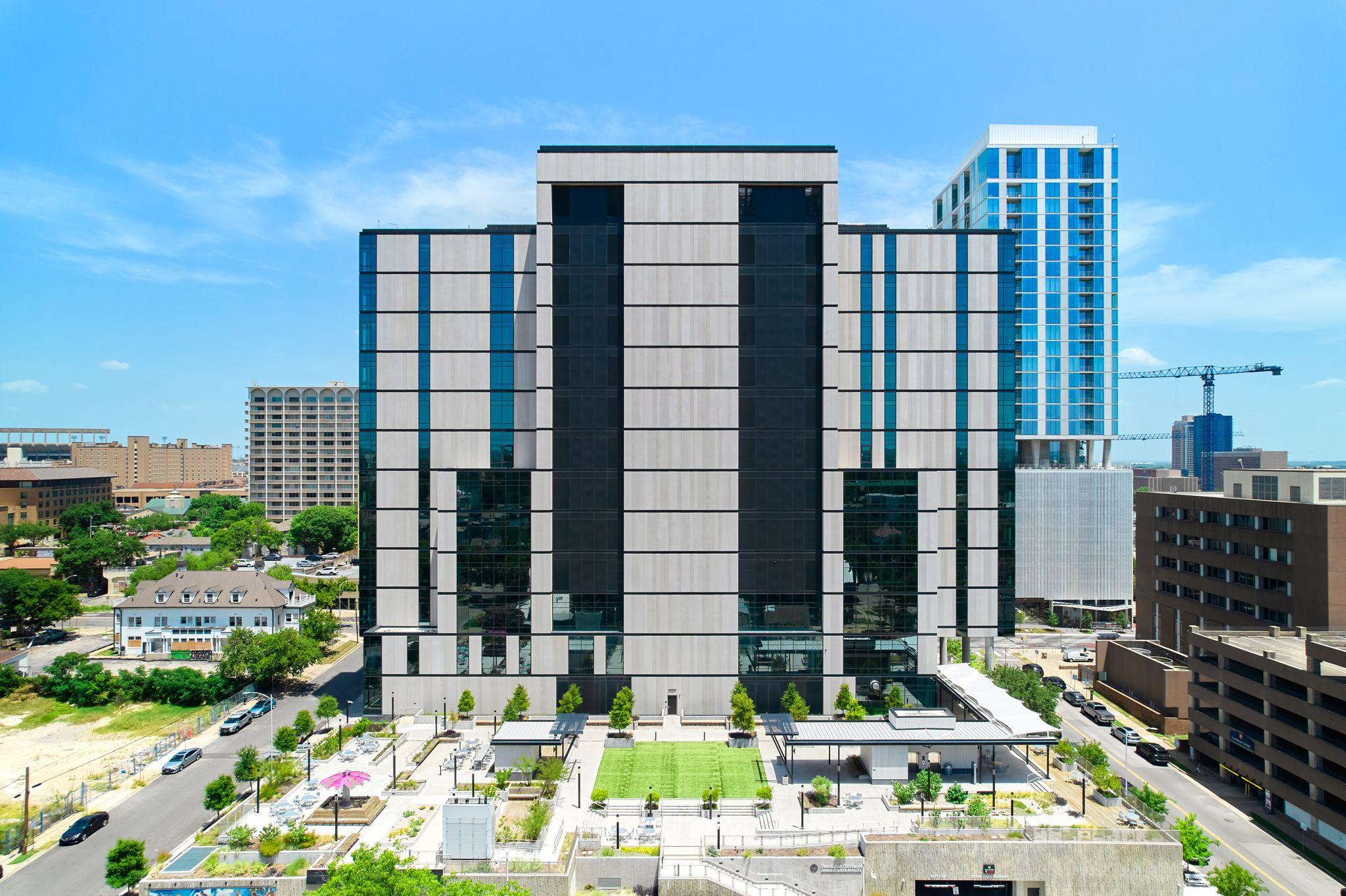 Aerial view of modern glass office towers around a green courtyard — Architectural photography, Austin Aerial view of modern glass office towers around a green courtyard