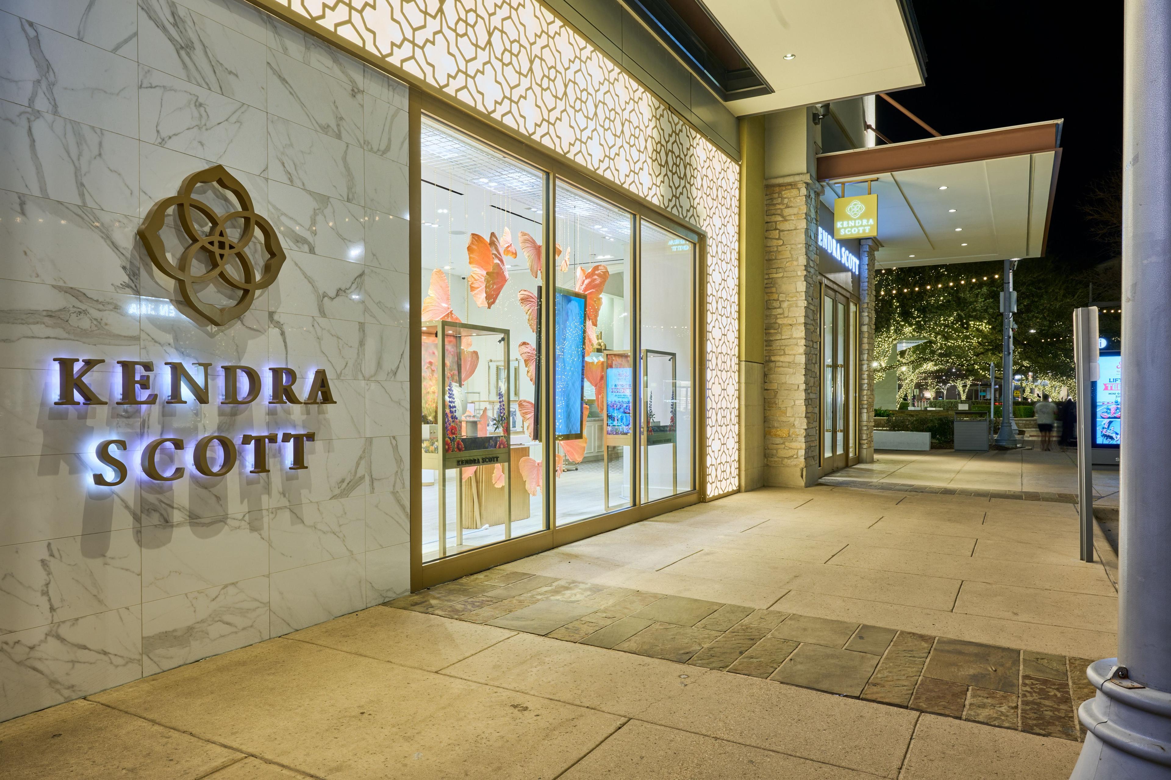 Lit retail frontage of marble and glass in The Domain after closing, nobody in the street — The Domain photography, Austin A lit retail frontage of marble and glass in The Domain after closing, nobody in the street