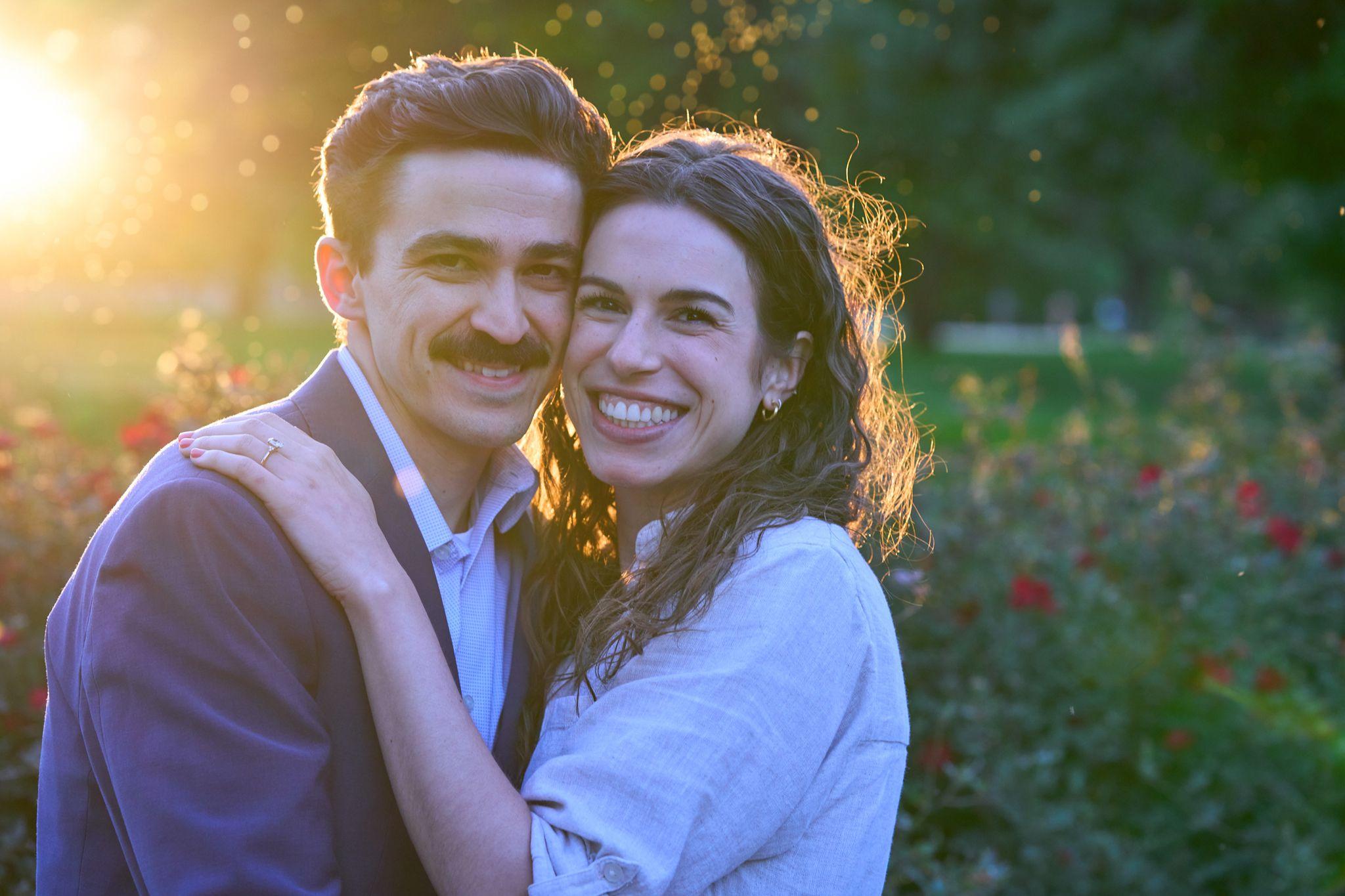 Couple laughing together in warm backlight at the park — Butler Metro Park photography, Austin A couple laughing together in warm backlight at the park.