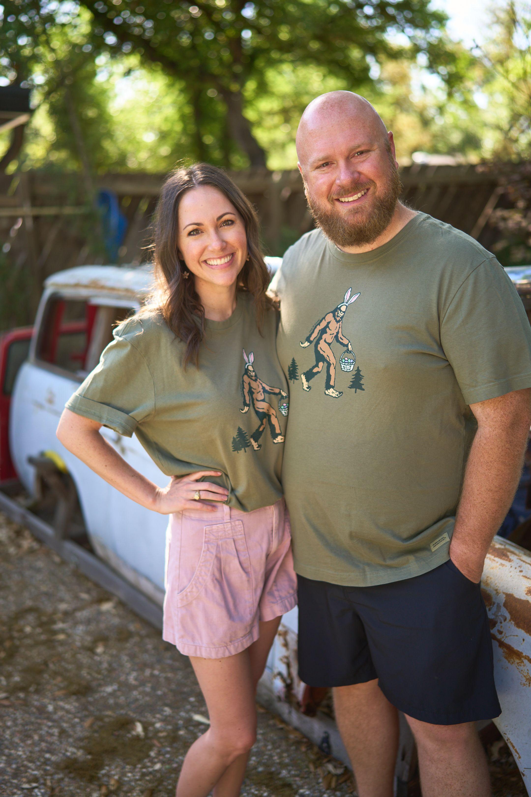 Couple in matching olive T-shirts standing beside a vintage pickup truck — Couples & Anniversary photography, Austin A couple in matching olive T-shirts standing beside a vintage pickup truck.