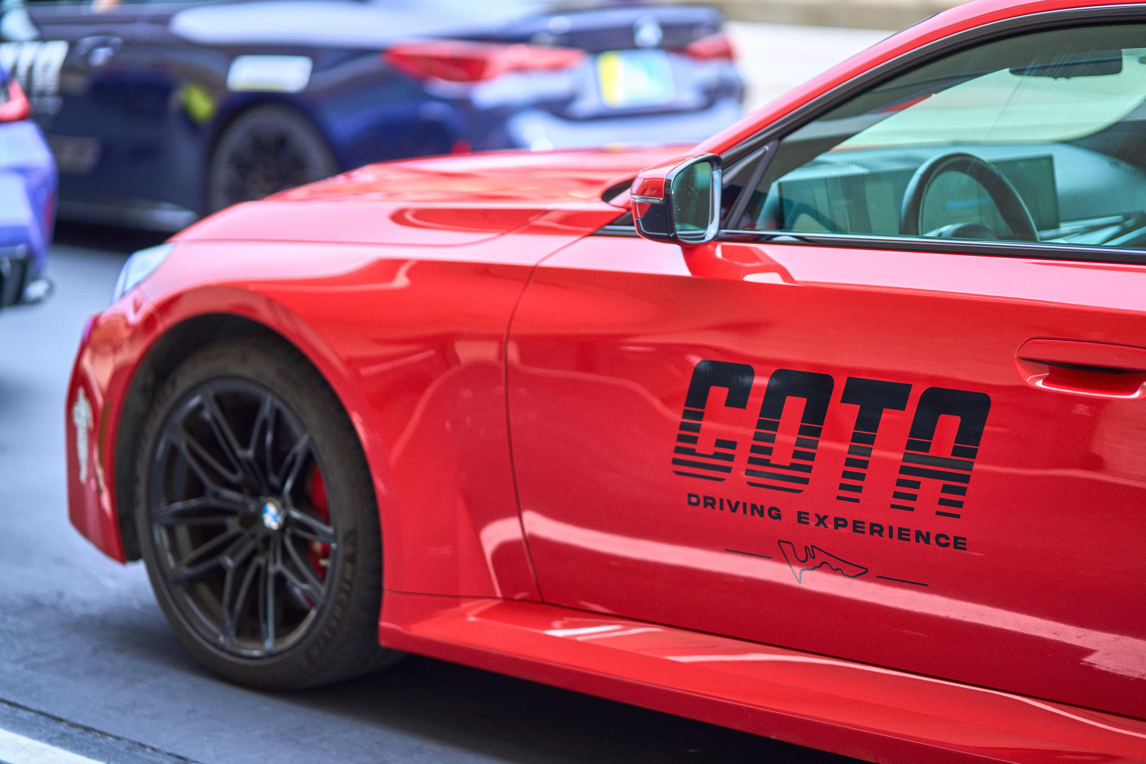 Red BMW M4 in COTA Driving Experience livery — Adventure & outdoor photography, Austin A red BMW M4 in COTA Driving Experience livery.