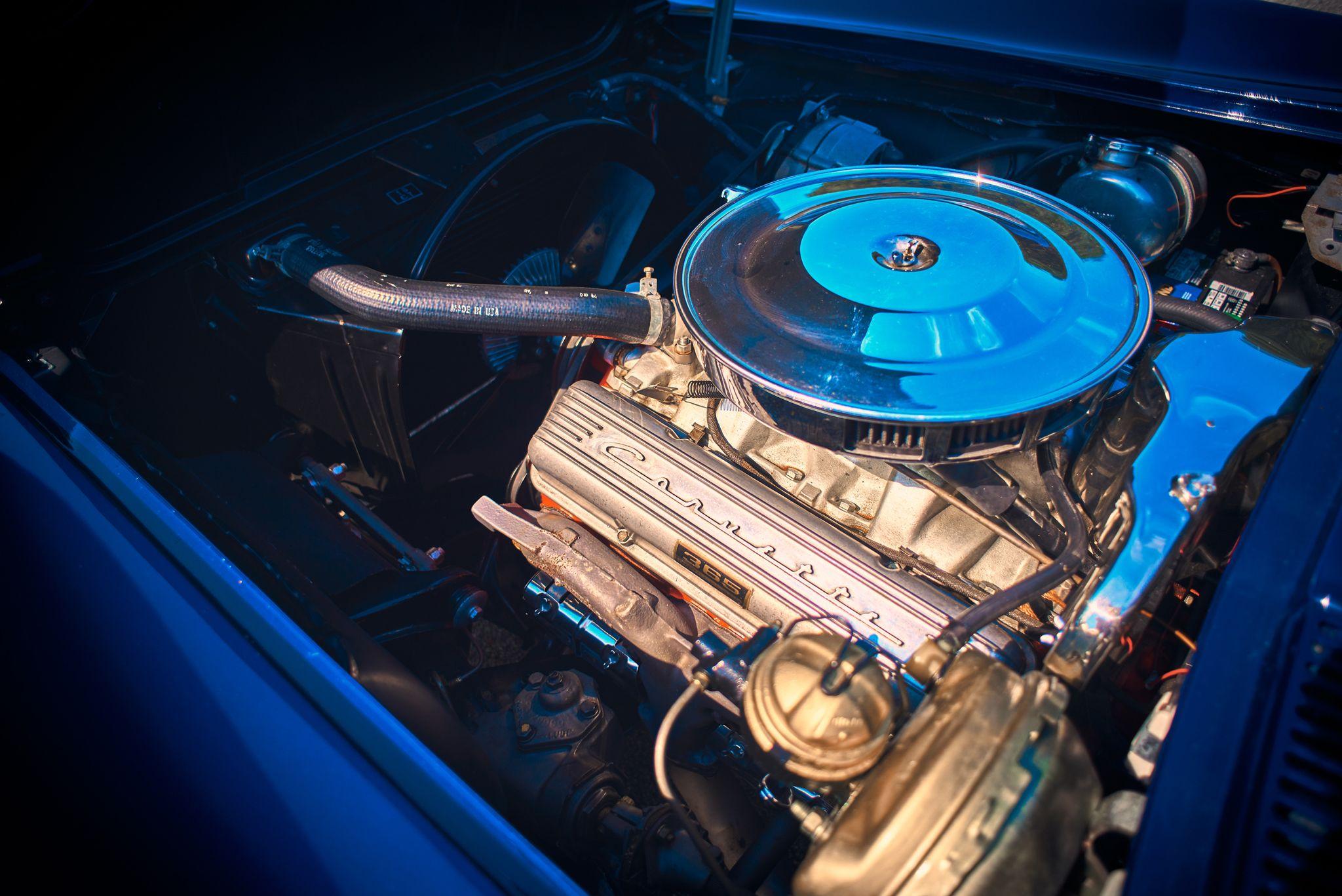 Chrome and blue engine bay of a classic car with the hood raised — Film & vintage photography, Austin The chrome and blue engine bay of a classic car with the hood raised.