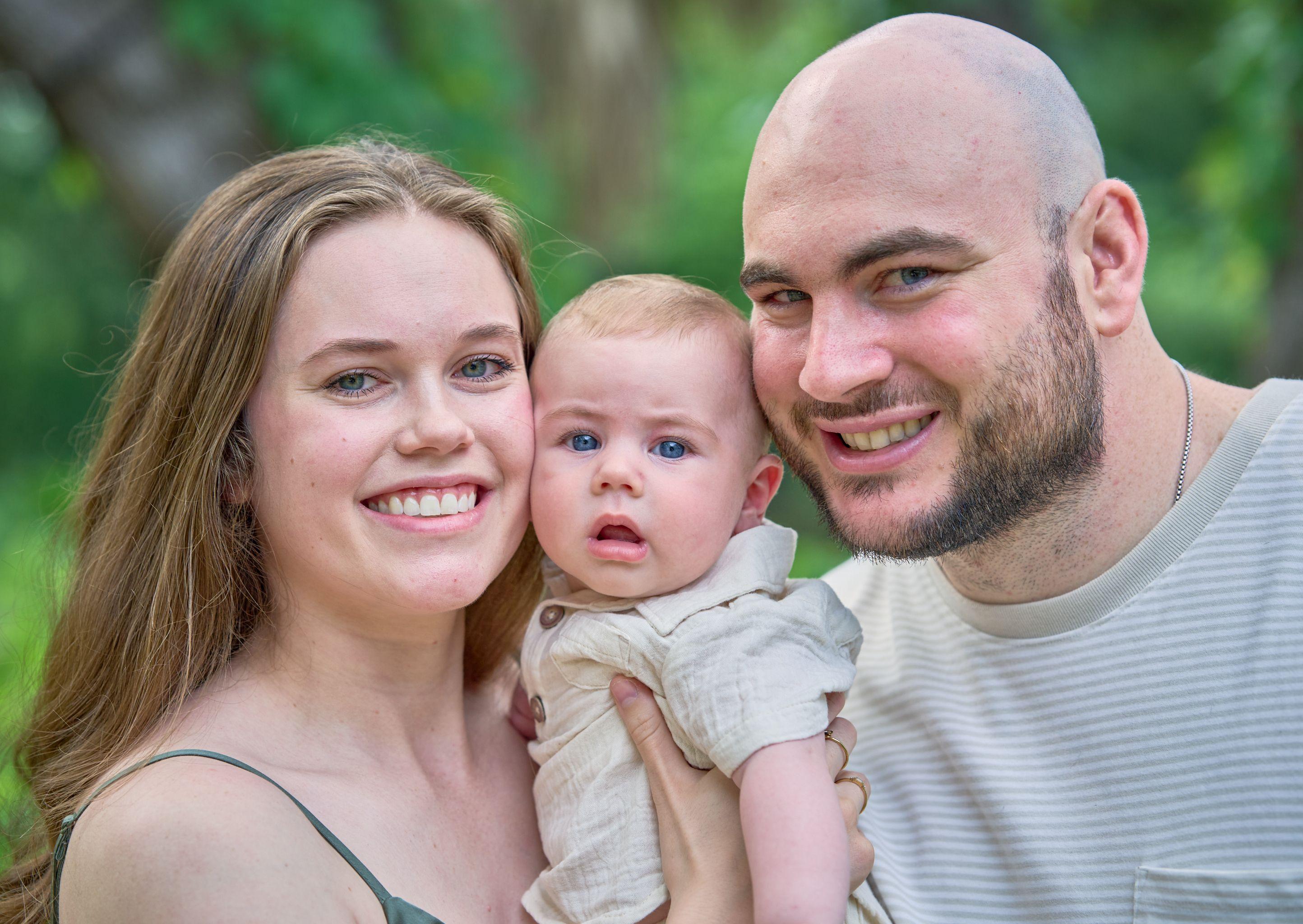 Mother, father and baby close together and smiling at Mayfield Park — Mayfield Park photography, Austin A mother, father and baby close together and smiling at Mayfield Park