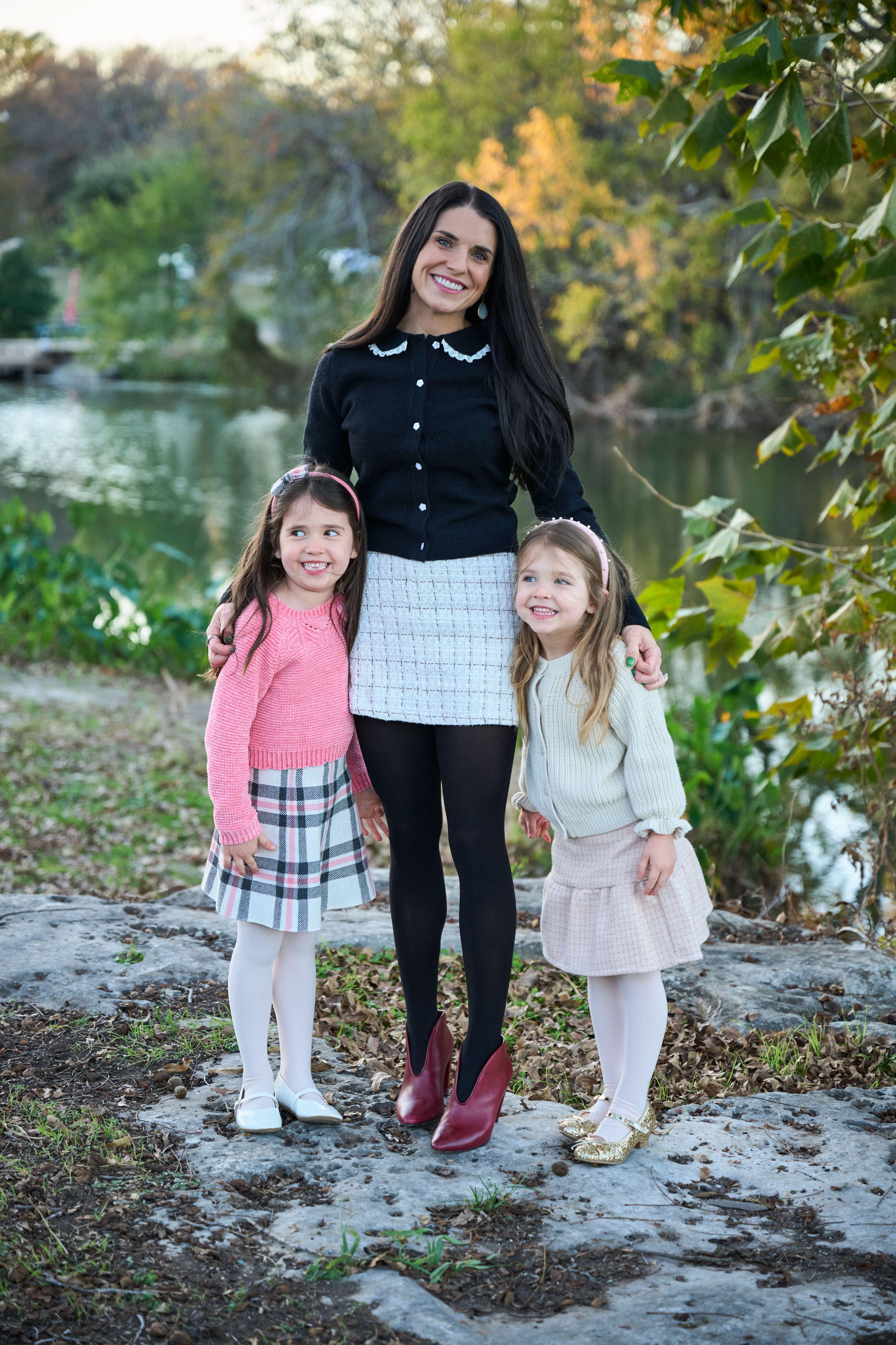 Mother and two daughters standing on rocks by a creek in autumn light — Round Rock Chisholm Trail Crossing photography, Austin A mother and two daughters standing on rocks by a creek in autumn light.