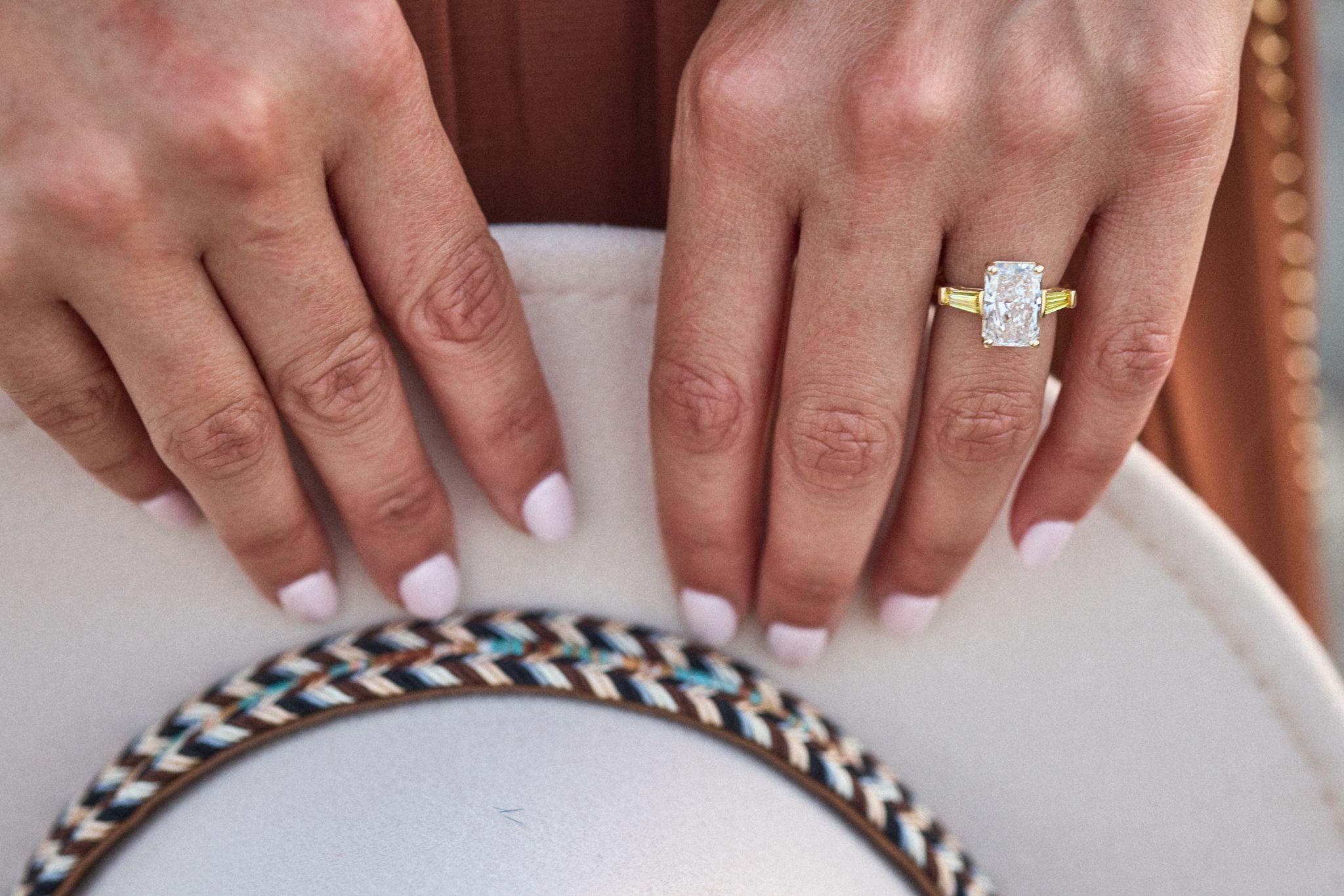 Close frame of an engagement ring resting on a straw hatband — Wimberley TX photography, Austin A close frame of an engagement ring resting on a straw hatband