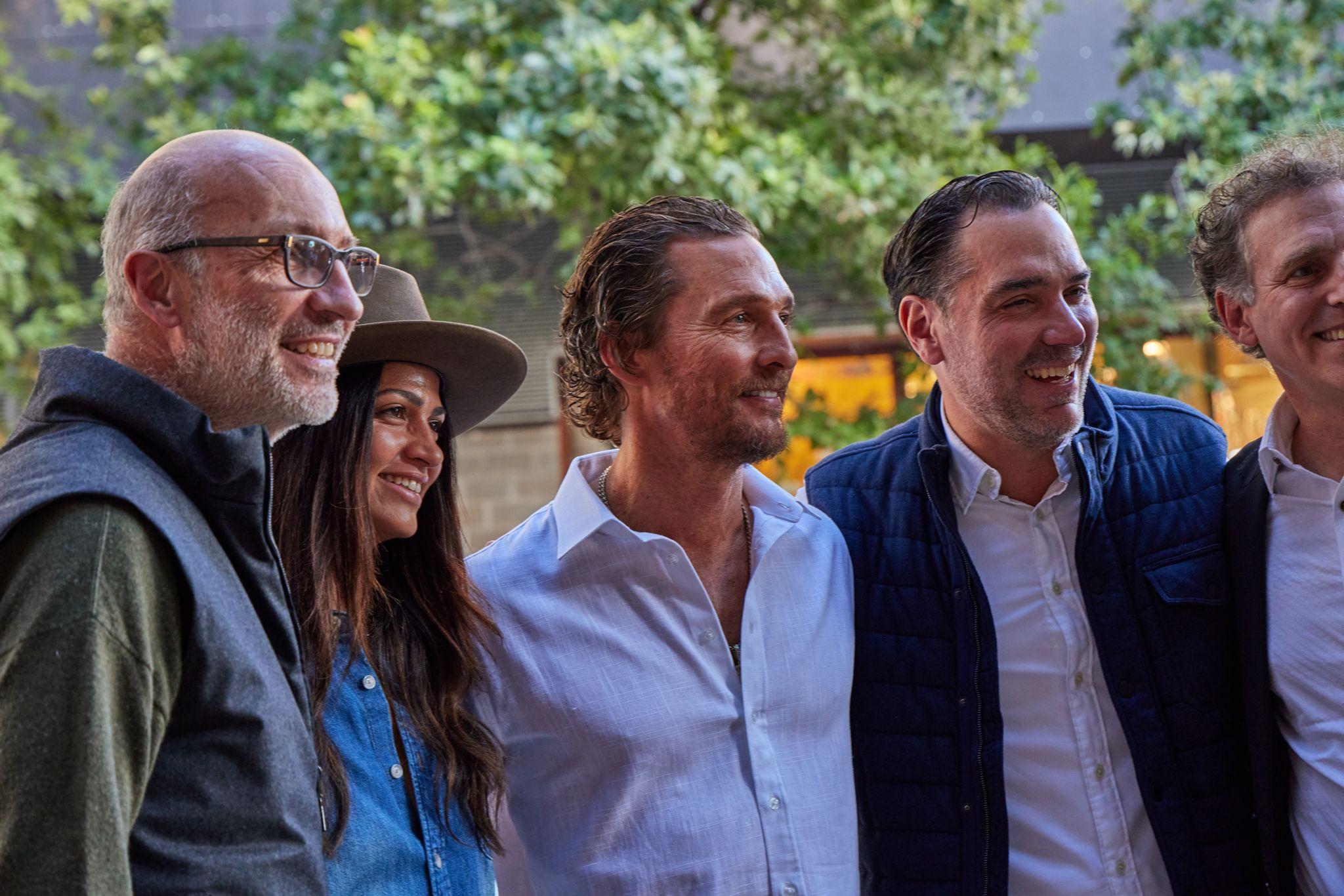 Guests talking outdoors at a tequila brand reception — Brand activation photography, Austin Guests talking outdoors at a tequila brand reception.