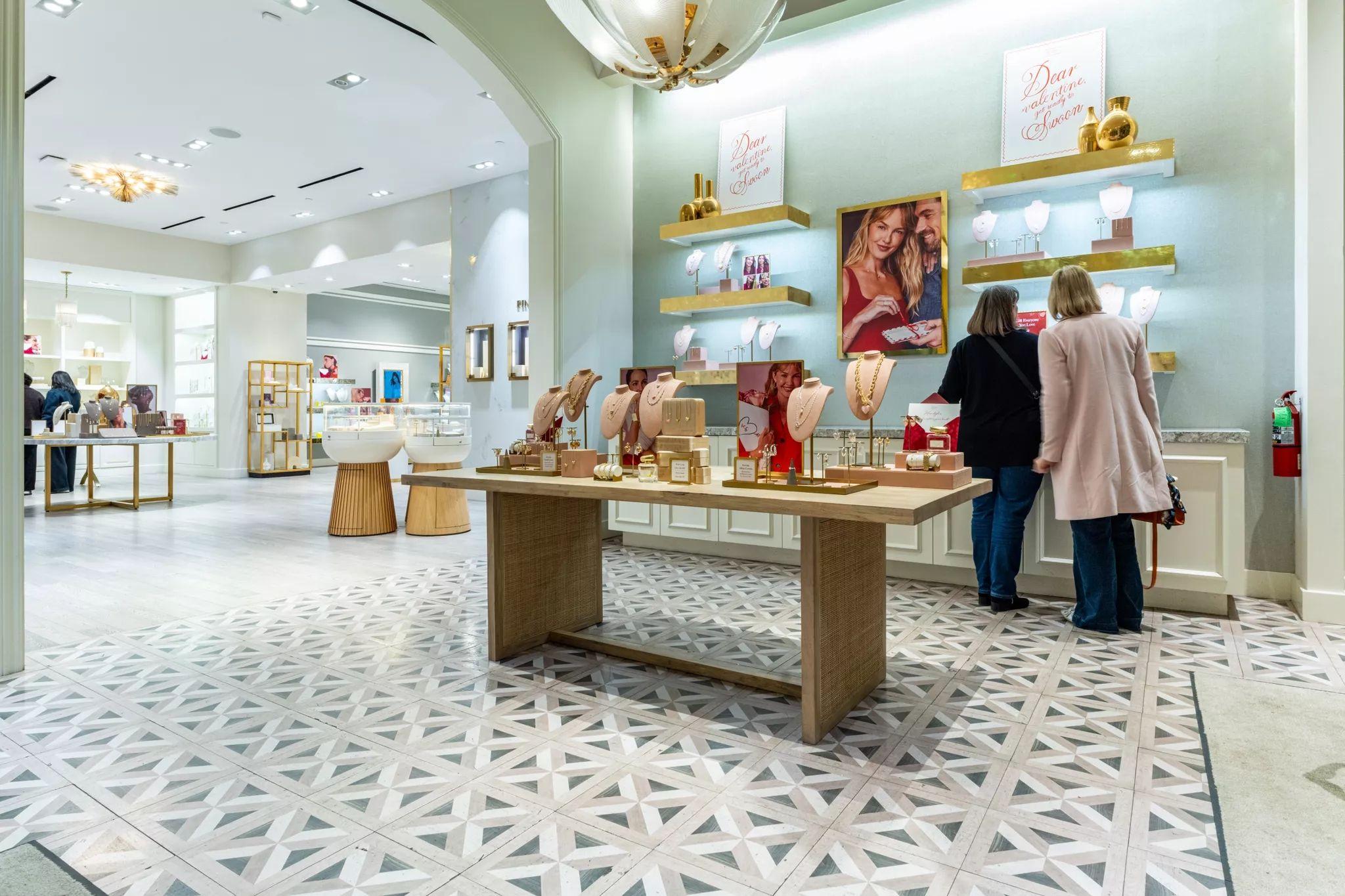 Jewelry retail interior with display tables and a patterned tile floor — Architectural photography, Austin A jewelry retail interior with display tables and a patterned tile floor.