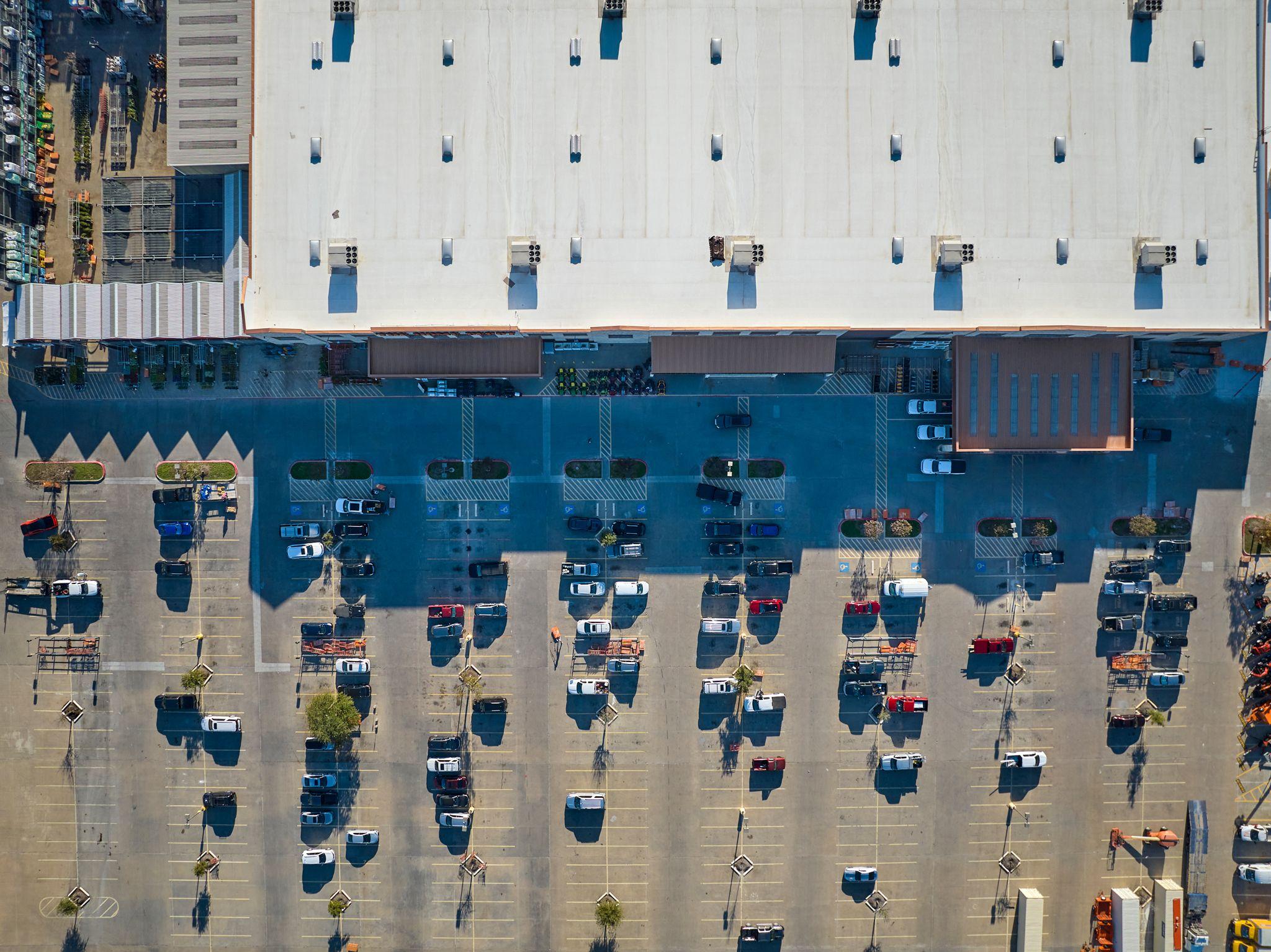 Top-down aerial of a large retail building and its parking lot — Aerial & drone photography, Austin Top-down aerial of a large retail building and its parking lot