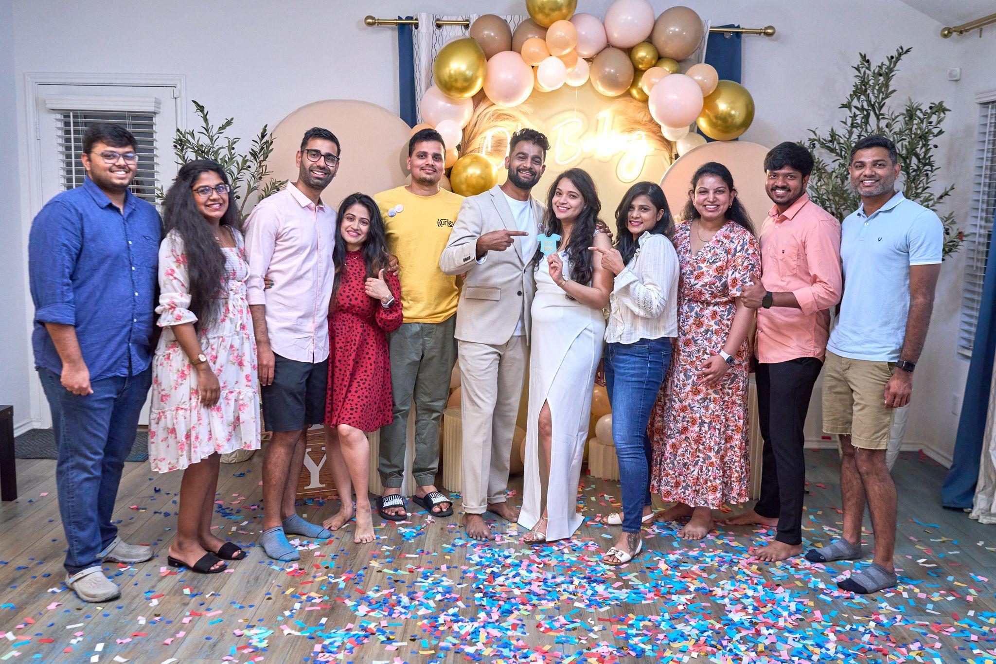 Group celebrating a gender reveal with falling confetti — Family Parties photography, Austin Group celebrating a gender reveal with falling confetti