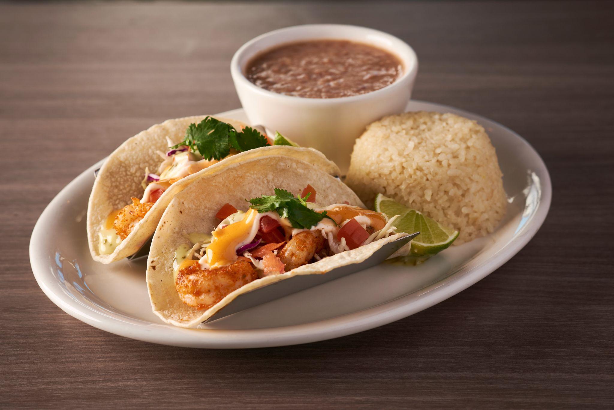 Fish tacos with rice and a bowl of soup on a white plate — Food & restaurant photography, Austin Fish tacos with rice and a bowl of soup on a white plate.