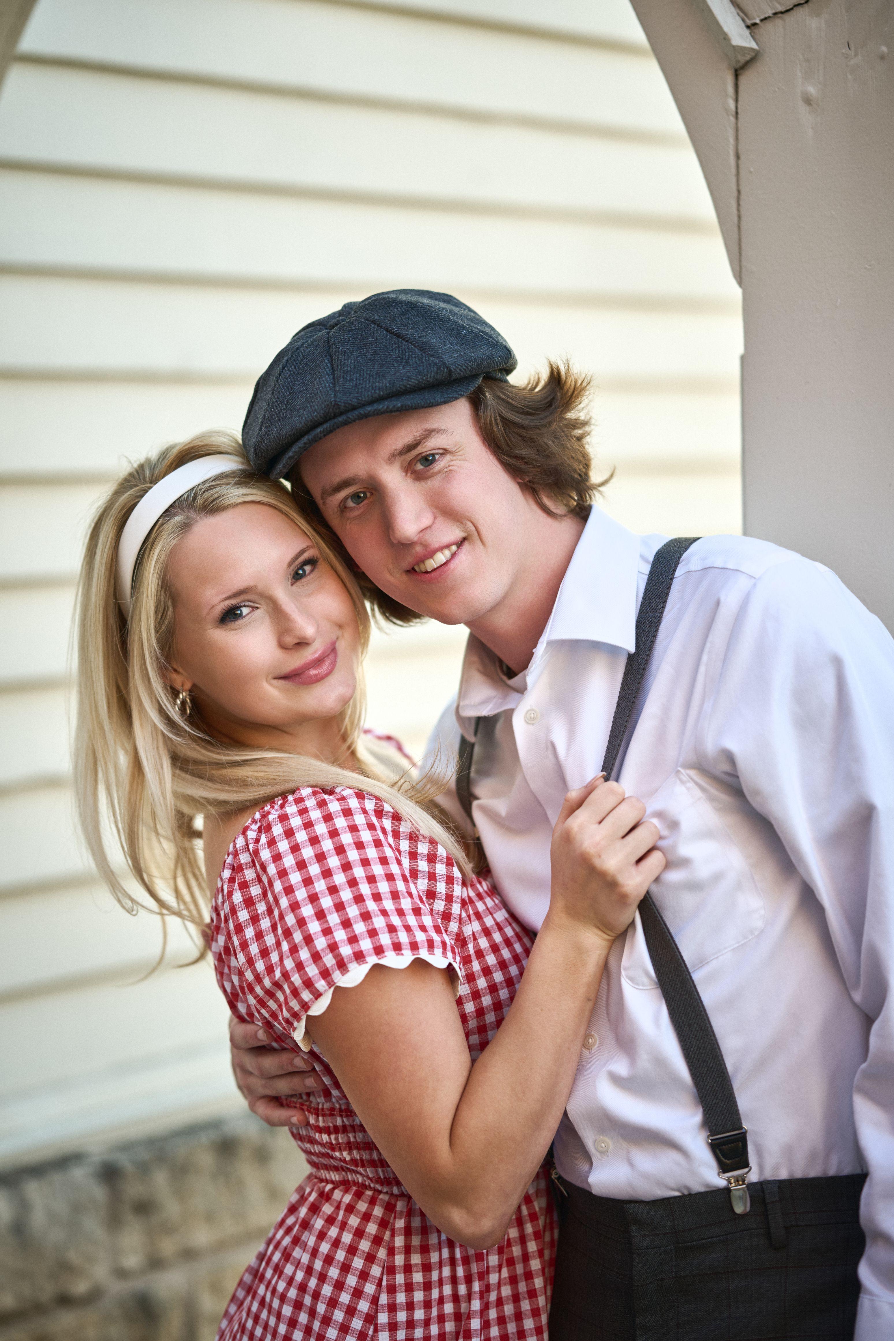 1940s-styled couple in newsboy caps embracing and smiling — Couples & Anniversary photography, Austin A 1940s-styled couple in newsboy caps embracing and smiling.