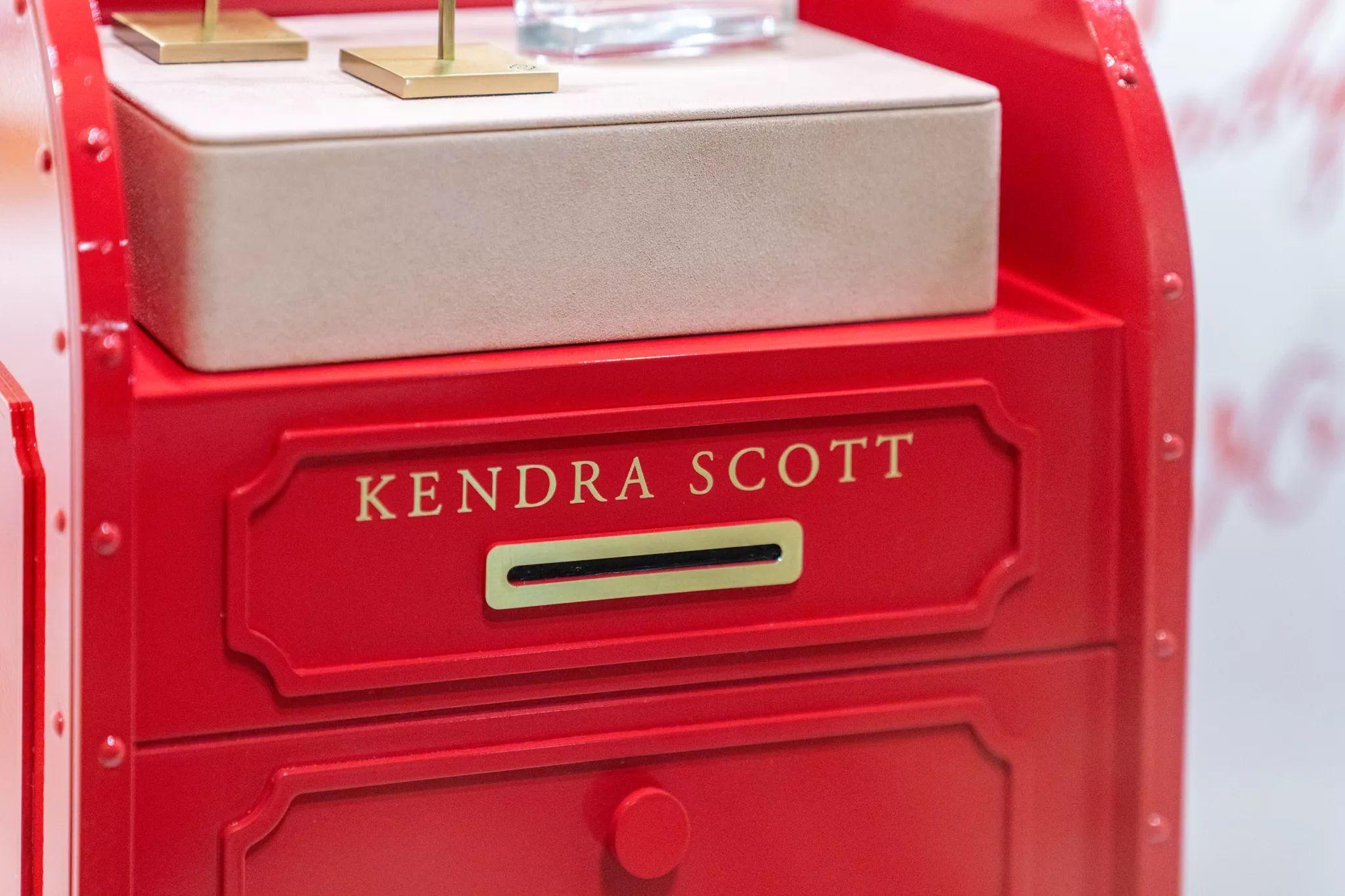 Close detail of a red Kendra Scott branded mailbox — Brand activation photography, Austin A close detail of a red Kendra Scott branded mailbox.