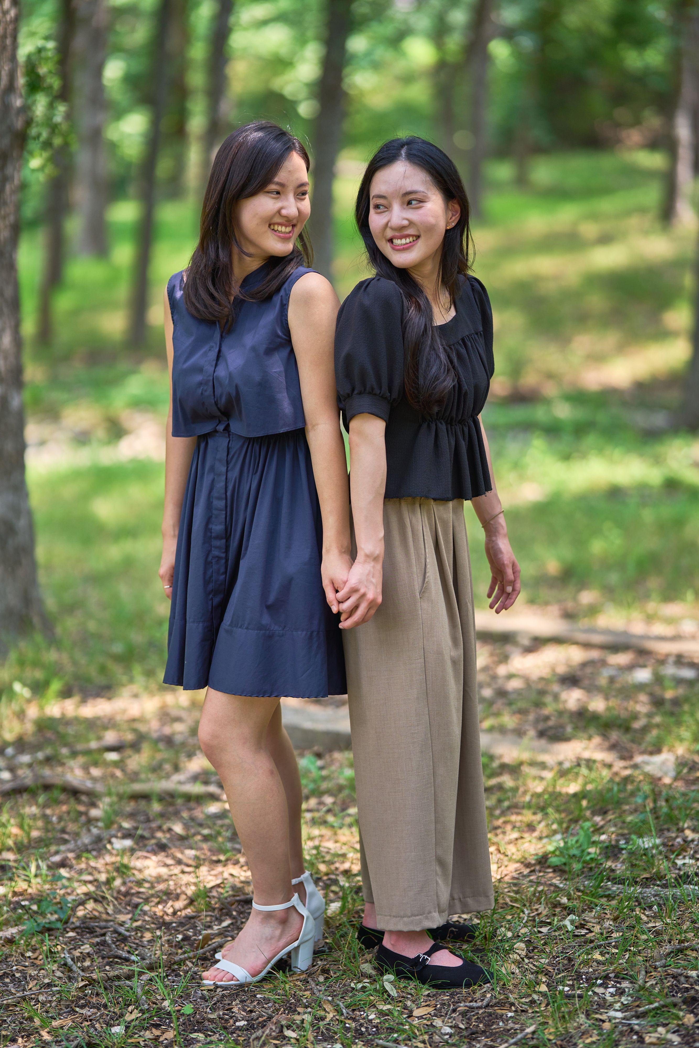 Two sisters standing together among the pines at Olson Meadows Park — Olson Meadows Park photography, Austin Two sisters standing together among the pines at Olson Meadows Park