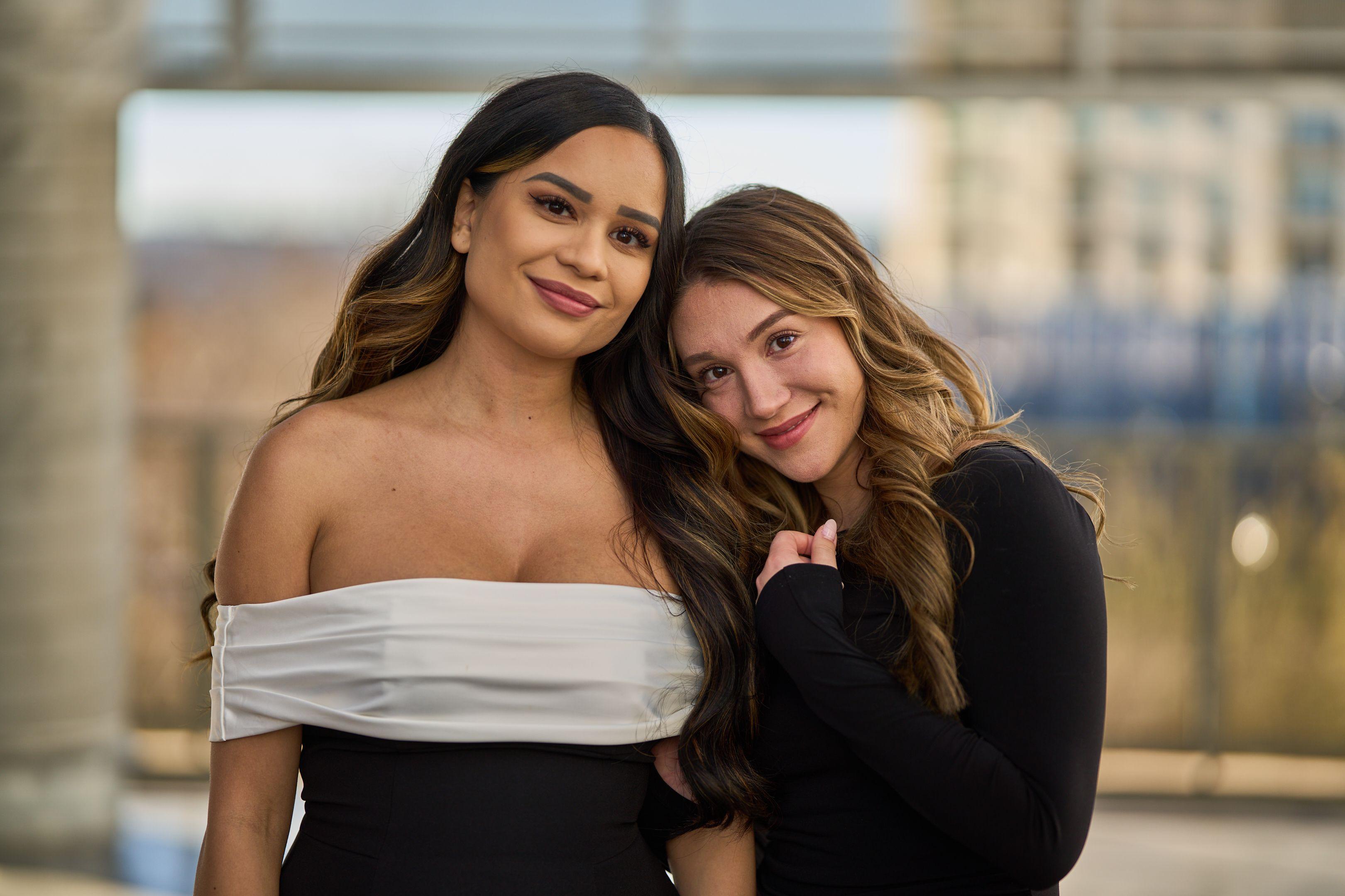 Two friends in black and white dresses leaning together for a close portrait — Bachelor & Bachelorette photography, Austin Two friends in black and white dresses leaning together for a close portrait.