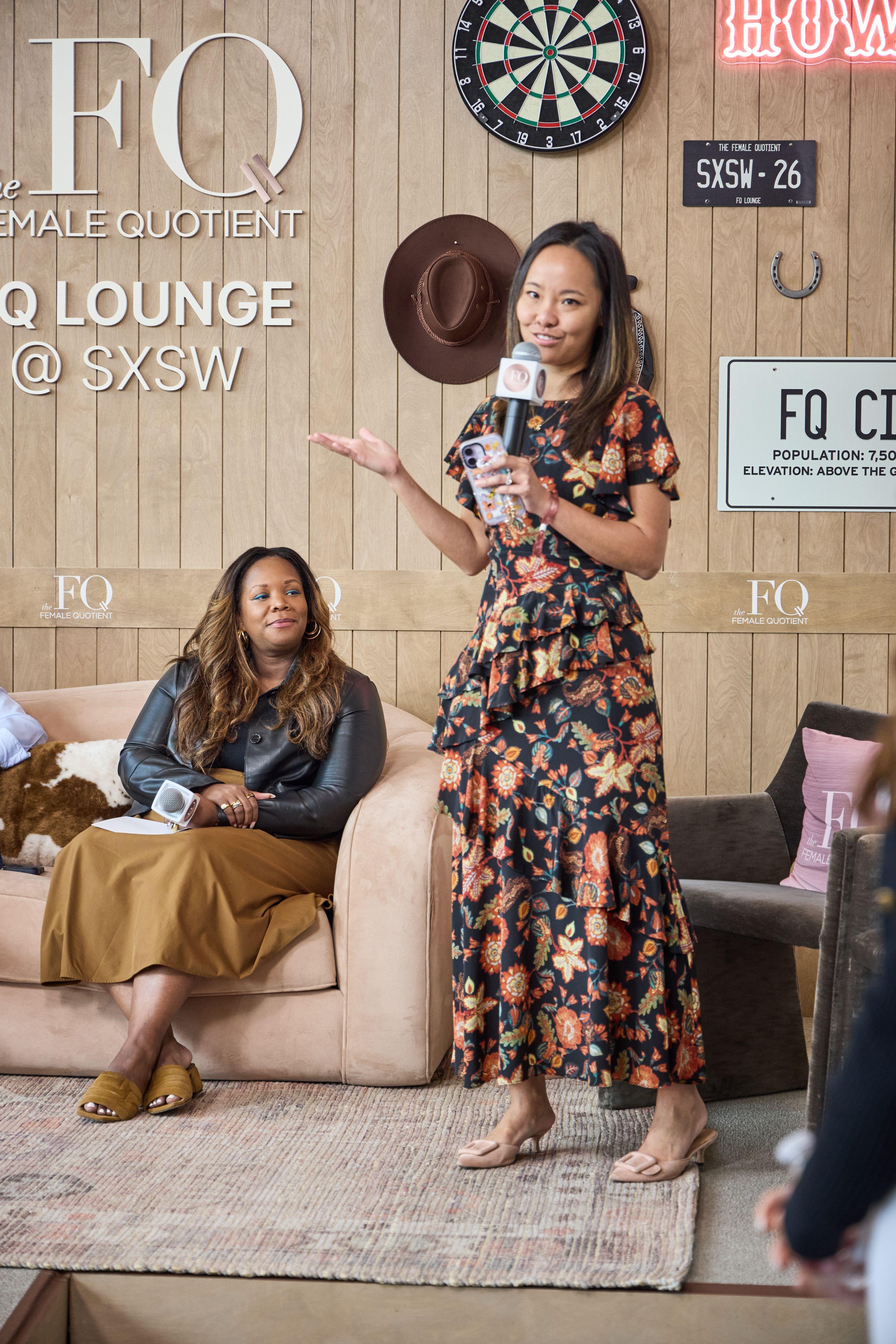 Host speaking into a microphone at the FQ Lounge at SXSW — Brand activation photography, Austin A host speaking into a microphone at the FQ Lounge at SXSW.