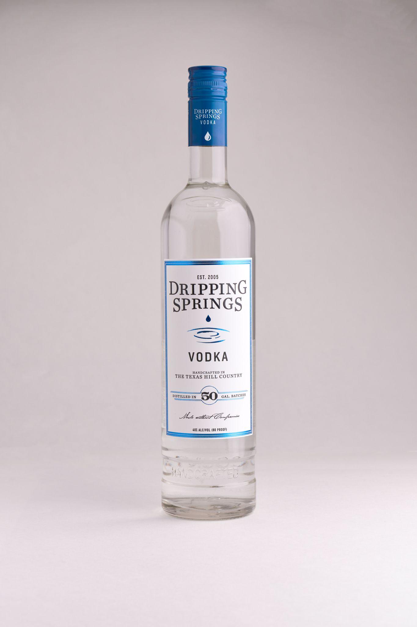 Bottle of Dripping Springs vodka on a plain white background — Product photography, Austin A bottle of Dripping Springs vodka on a plain white background.