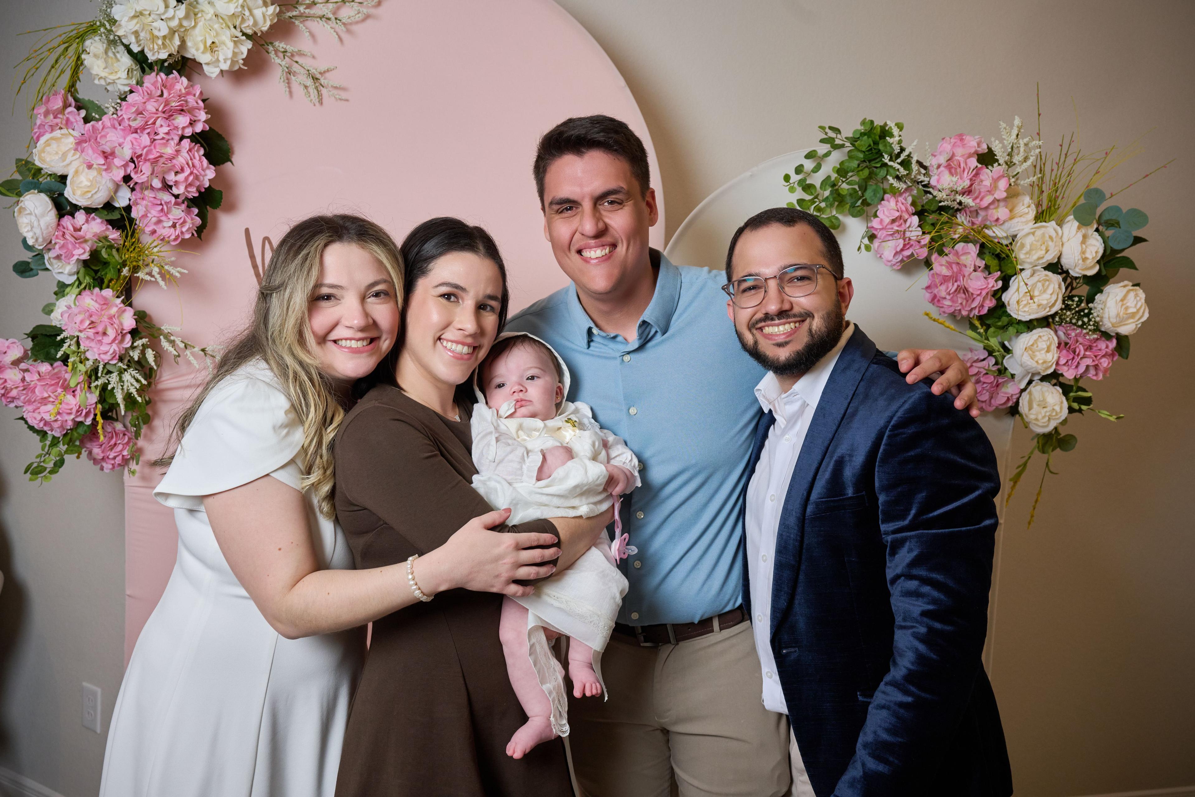 Family and godparents gathered around a newborn in a white christening gown — Family Parties photography, Austin Family and godparents gathered around a newborn in a white christening gown.