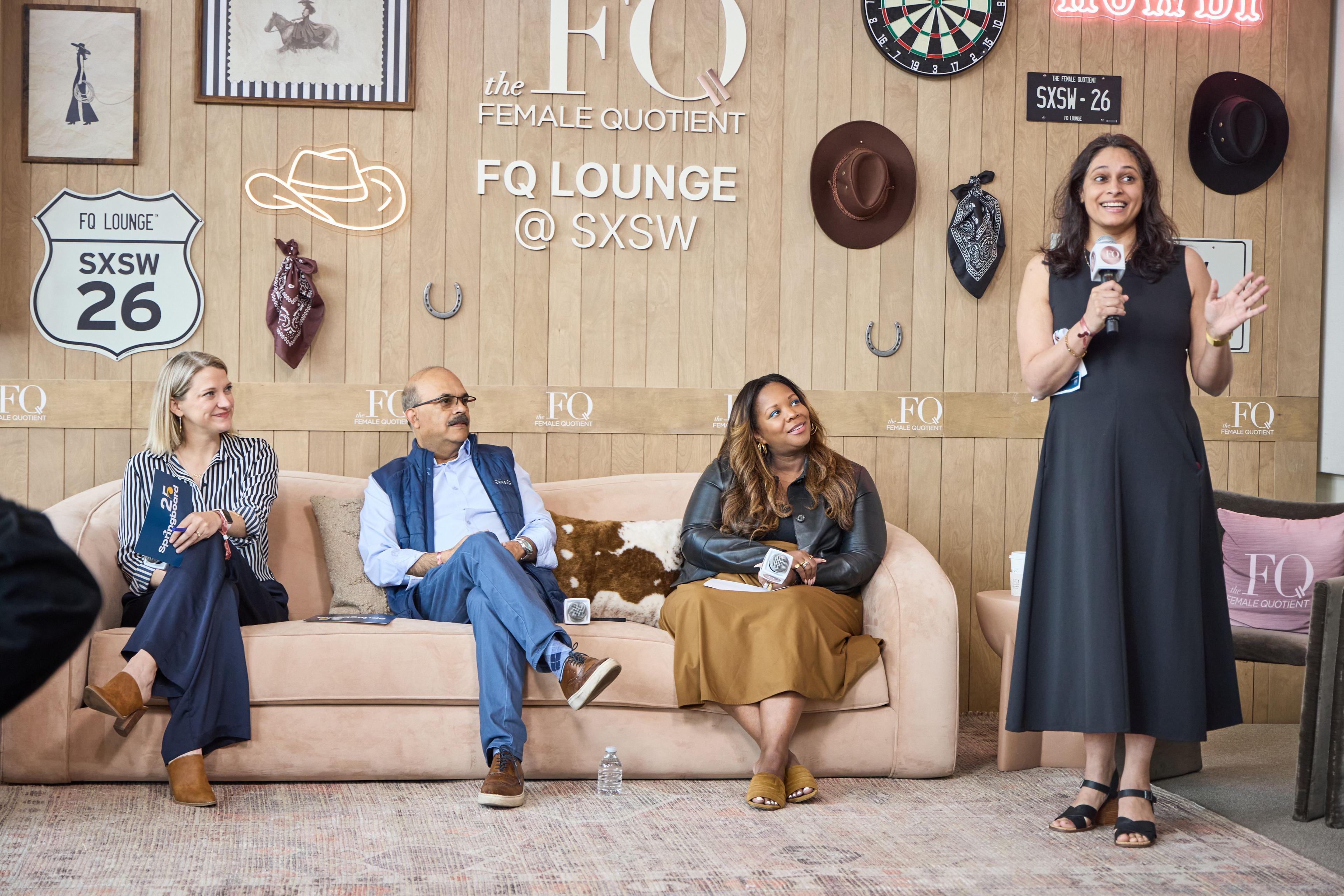Two panelists seated on a sofa beneath the FQ Lounge @ SXSW signage — Conventions & Tradeshows photography, Austin Two panelists seated on a sofa beneath the FQ Lounge @ SXSW signage.