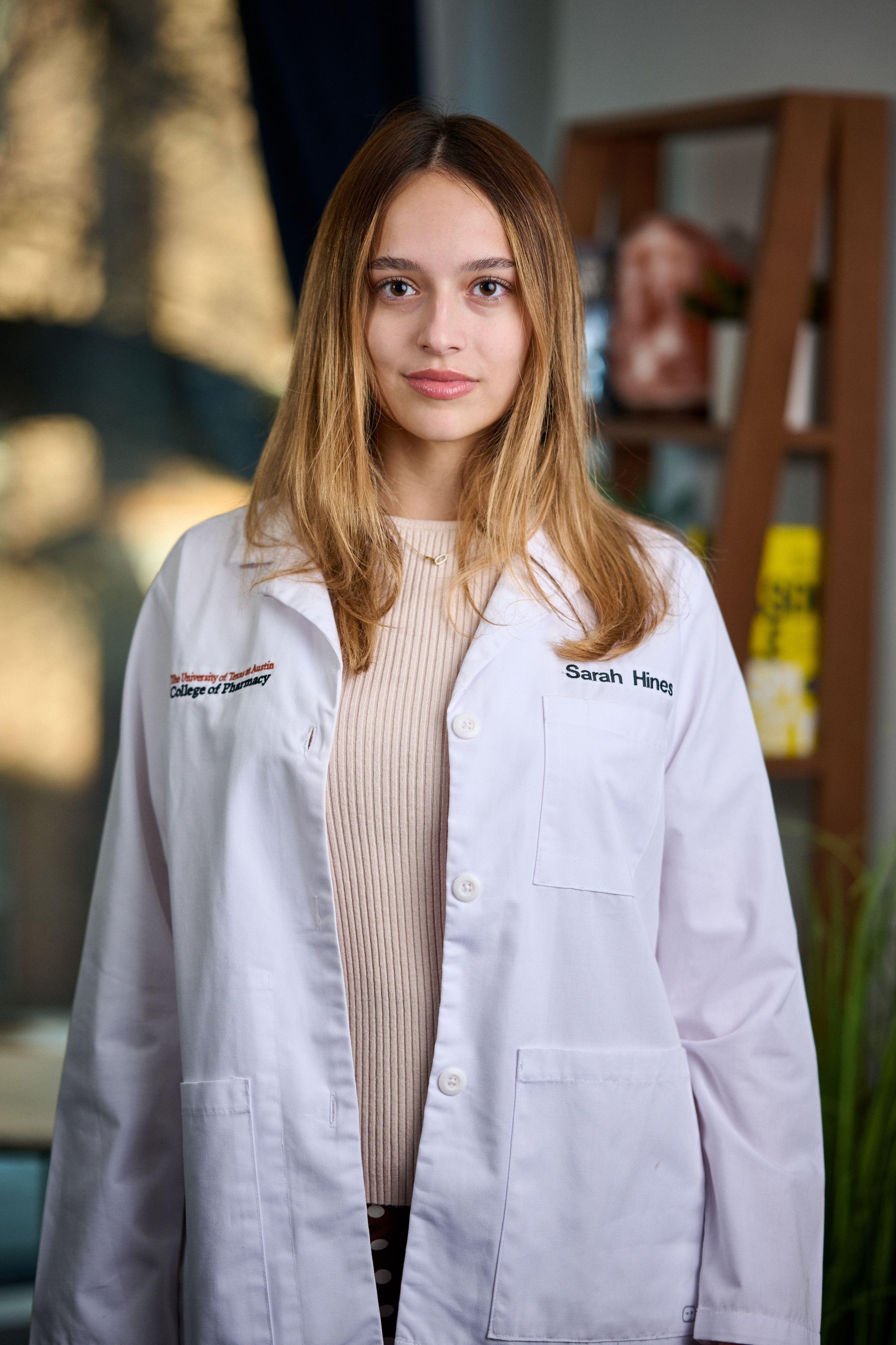 Pharmacy student in a white coat photographed in a lab — Headshot photography, Austin A pharmacy student in a white coat photographed in a lab.