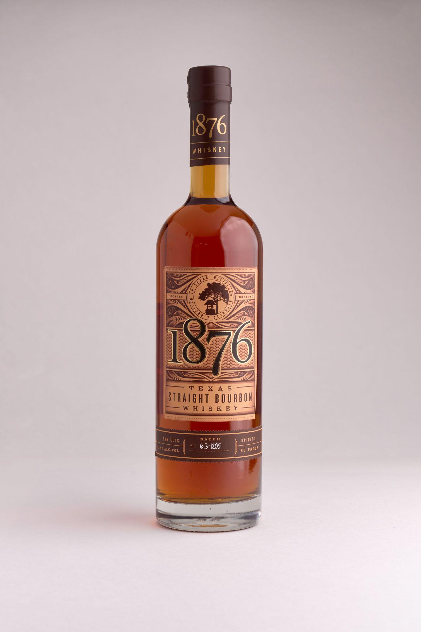 Bottle of 1876 straight bourbon on a pale background — Food & restaurant photography, Austin A bottle of 1876 straight bourbon on a pale background.